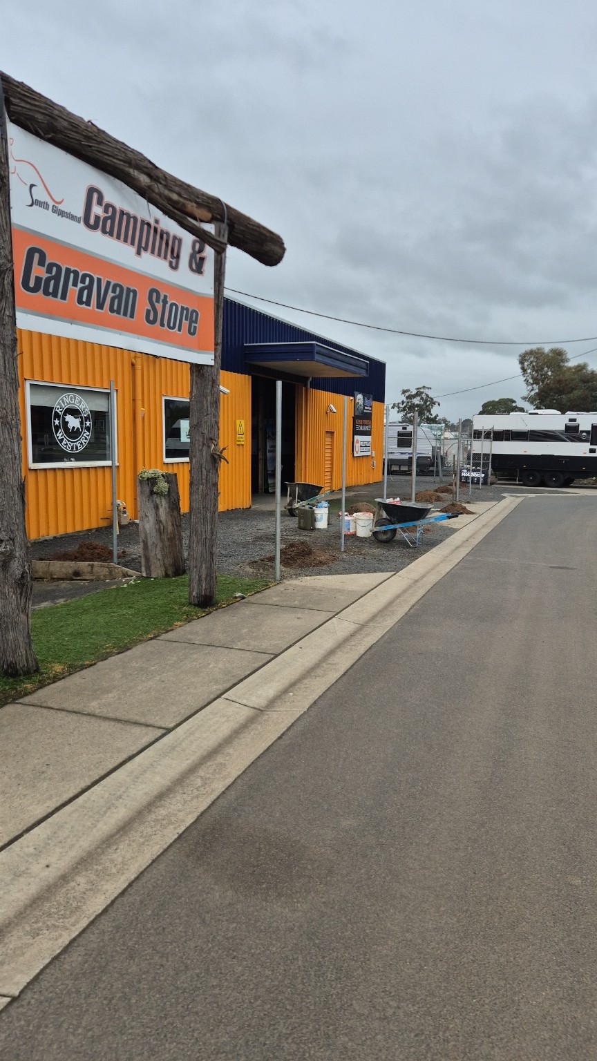 Galvanised chain mesh fencing with barbed wire along the South Gippsland Caravans frontage